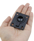 Close-up of black square flush hatch pull handle with central dome and four mounting holes