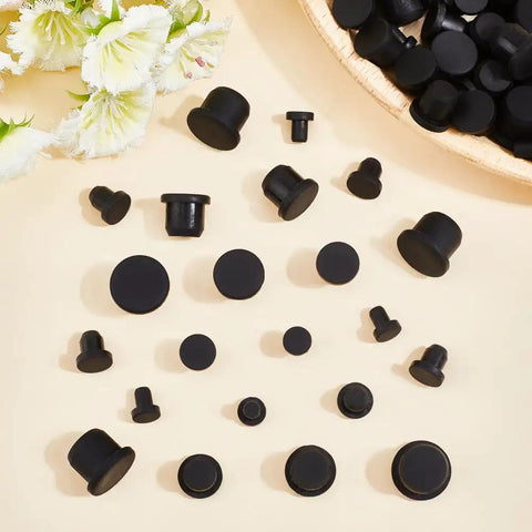 Grab This Awesome Set Of 50 Black Silicone Stopper Plugs In 5 Sizes For Tubes Bottles And Flows To Seal Ends Waterproof With Gorge Craft Quality Rubber Caps Perfect For DIY Projects Or Home Repairs Today. Black silicone stopper plugs in assorted sizes, top view