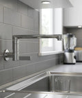 Wall Mounted Extended Kitchen Faucet Cold Only Rotatable Spout 304 Stainless Steel Single Lever for Mop Pool Utility Sink Silver(25cm) installed in modern kitchen.