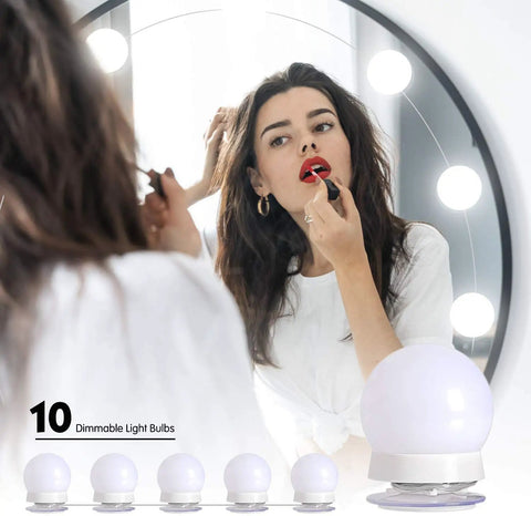 Vanity Light Strip Kit With 14 Dimmable Bulbs For Full Body Makeup Mirrors, woman applying makeup in mirror.
