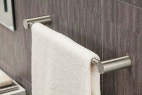 Align 24-Inch Modern Single Towel Bar In Brushed Nickel For Bathroom Or Kitchen installed with a white towel hanging