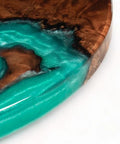 Close-up of 16 Inch Turquoise Epoxy Resin Lazy Susan Wood Turntable Organizer showcasing turquoise and wood texture.