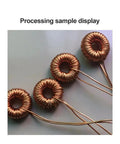 Processing sample of toroidal transformers wrapped with copper wire, demonstrating Heavy Duty Belt Type Ring Winder for Toroidal Transformers and Inductance Coils.