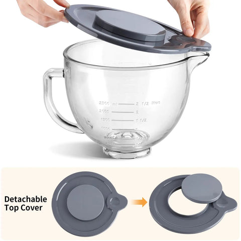 Hands holding a detachable lid for a clear mixer bowl labeled as detachable top cover.
