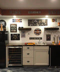 Vintage kitchen decor with various tin signs, including Route US 66, wine and beer signs, and classic Harley-Davidson artwork.