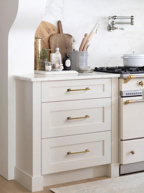 Modern kitchen featuring drawers with 10 Pack Antique Brass Cabinet Pulls With 3 Inch Center Hole Retro Vintage Square Drawer Pulls.
