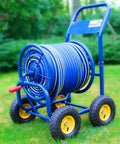 Heavy Duty Outdoor Garden Hose Reel Cart With Smooth Rolling Wheels And Rust Proof Steel Frame Built Like A Tank For Zero Drama Car Washing Plus Hustle Free Lawn Watering Setup 25 Millimeter Brass Connector on grass