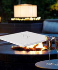 Stainless Steel Fire Pit Cover For 21 And 27 Inch Round Pits With Handle Portable Fire Pit Lid To Seal In Heat at night scene