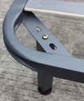 Close-up of Adjustable Height Metal Furniture Lift Legs Set Four Square Tube Legs With Reinforced Frame Support in dark grey.