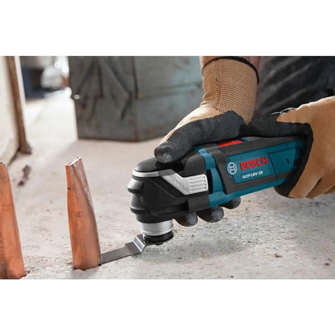18V EC Brushless Oscillating Multi Tool With StarlockPlus Quick Change System being used for precise metalwork cutting