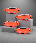 Orange Heavy Duty Skate Dolly With 4 PU Wheels Beefy 360 Degree Rotatable Rollers shown on display blocks