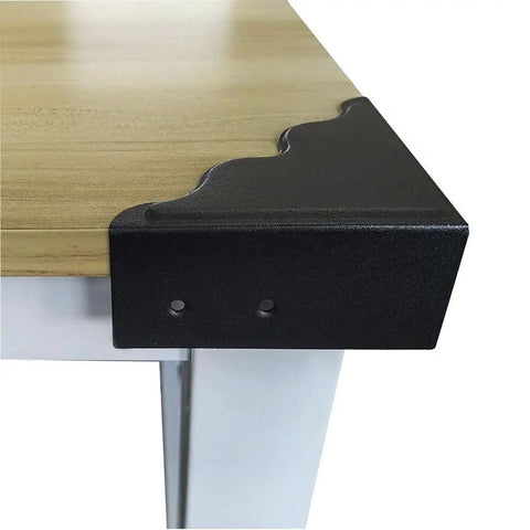 Keep Your Walls Pristine With These Tough Black Metal Corner Protectors Featuring Rust Resistant Build And Slick Smooth Edges For 3.7 Inch Wall Edge Shield Four Pack on wooden table edge.