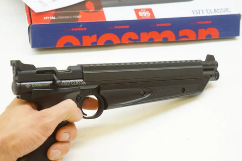Close-up of Crosman 1322 air pistol with Scope Rail Mount Adapter for Crosman 1377 1322 20mm Top Rail Weaver Picatinny