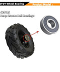 6201RS Mini Bike Wheel Bearing Kit with deep groove ball bearings, shown with a mini bike tire, for Coleman CT100U CT100X RB100 RB200.