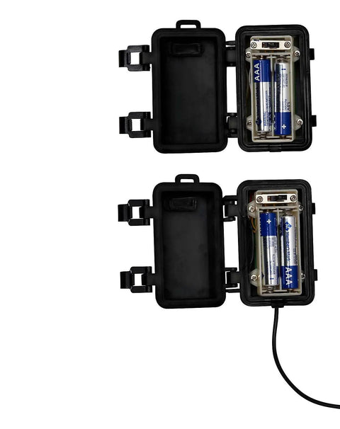 Open battery compartments of Battery Powered IR Beam Sensor Animatronic Activator For Halloween Displays With 20 Ft Range.