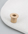 8 Pack Flanged Copper Sleeve Bushings 6 Mm Bore 10 Mm Outer Diameter 12 Mm Length on a neutral surface, highlighting the flange design.