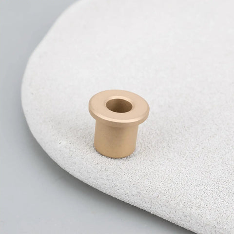 8 Pack Flanged Copper Sleeve Bushings 6 Mm Bore 10 Mm Outer Diameter 12 Mm Length on a neutral surface, highlighting the flange design.