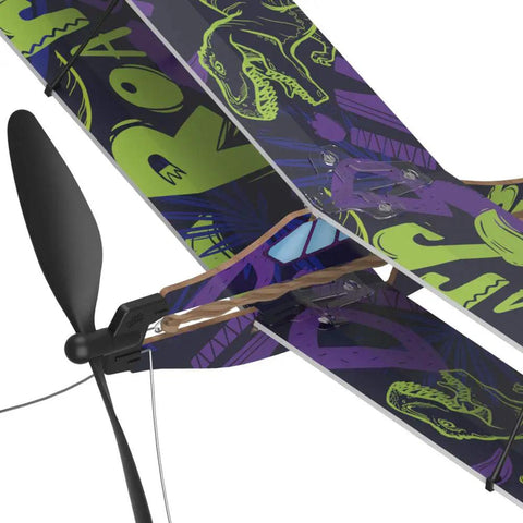 Rubber Band Airplane Biplane STEM Kit With Learning Booklet And Display Stand For Indoor And Outdoor Fun Ages 14 And Up No Batteries Required Awesome Christmas Gift For Boys And Girls, close-up of black propeller and purple biplane wing