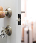 Door Ball Catch Set Built From Stainless Steel And Copper With Four Adjustable Units Hidden Positioning Mechanism shown on door.