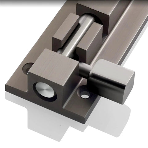 Close-up view of Snaps Shut Sliding Bolt Door Latch With Instant Auto Return Action, heavy duty metal construction.