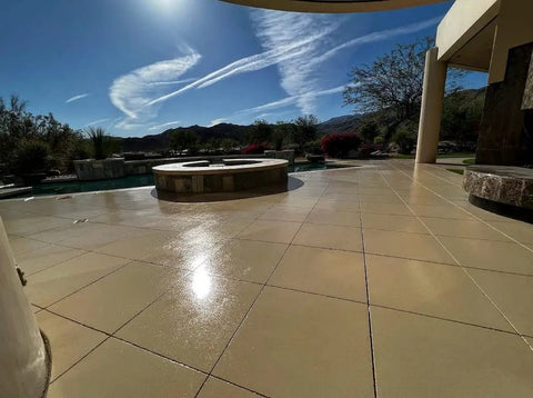 Real Deal Floor Sealer And Epoxy Topcoat That Refreshes And Beautifies Polished Concrete With A Knockout Flake Coating Built For Gritty Warehouse Jobs One Gallon Jug on polished concrete outdoors.