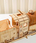 Close-up of 3D Wooden Steam Train Building Set For Adults With Wind Up Mechanical System And Track Rubber Band Powered Locomotive Kit