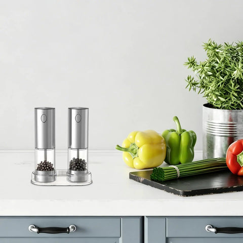 Touch Activated Automatic Electric Spice Grinder With Soft Glow LED Light Salt And Pepper Mill For Kitchen Countertop on a kitchen countertop.