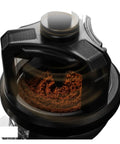 Automatic Rotating Wdt Tool Espresso Needle Distributor Anti Clumping Coffee Grinder Accessory 53 Mm showing ground coffee preparation process.