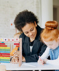 The Real Deal Wooden Abacus For Kids Featuring 100 Brightly Colored Beads Perfect For Kickstarting Math Foundations And Montessori Counting Drills Preschool Classrooms with a teacher and student.