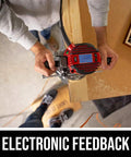 Overhead view of 14 Amp Plunge And Fixed Base Router Kit With LCD Speed Display And Electronic RPM Feedback in use on wood