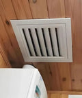 No Sweat 20X30 Inch Aluminum Louvered Access Panel With Integrated Filter mounted in ceiling providing airflow.