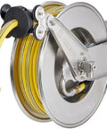 Badass Automatic Hose Reel With Rust Proof Stainless Steel Frame And Smooth Auto Rewind Setup Including Wall Mount Bracket For Zero Tangle Garden Water Storage, featuring yellow hose and metal construction.