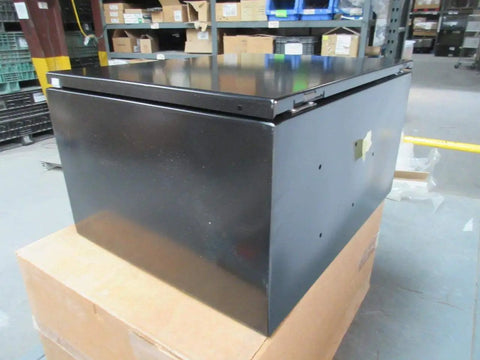 Black 20x16x10 Industrial Control Panel Enclosure, steel, angled view, in warehouse setting, demonstrates durable and weatherproof design.