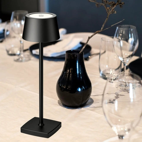 Rechargeable Cordless LED Desk Lamp with Lightweight Aluminum Body and Wireless Charging Base on Dining Table