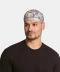 Man wearing Cooling Helmet Liner That Cools Instantly When Wet, UPF 50 Sun Protection, Wear Under Helmets And Hard Hats