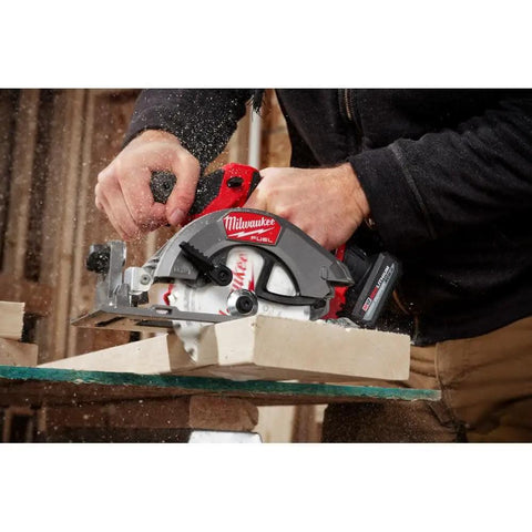 M12 Fuel 5-3/8 Inch Circular Saw Cordless With Brushless Powerstate Motor in use, showing clean cuts through wood