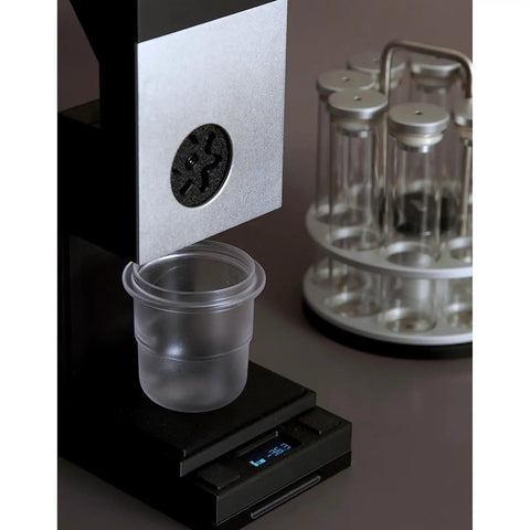 Premium Coffee Bean Counter Dispenser Offers Single Dose And Continuous Modes For Cafe Pros with clear cup on scale.