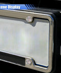 Fly Bling Rhinestone License Plate Screw Kit With Anti Theft Caps and Dope Sparkly Bolts For Truck Suv Car Exterior Rides close-up of rhinestone screws on a vehicle license plate.
