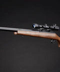 Beast Mode Bolt Action Airsoft Sniper Rifle With Adjustable Magnified Aluminum Scope on wood stock and metal rail.