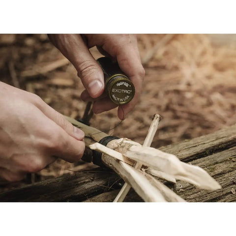 Using Rip Spool Field Repair Kit Orange for quick outdoor fixes in a survival situation, includes durable tools for emergency use