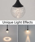 Lit Cylinder Bubble Crystal Pendant Lights LED Hanging Ceiling Fixtures with unique light effects against a plain background