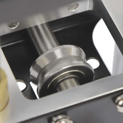 Close-up of V-roller in Sheet Metal Bender Tool With Manual Brake And Shears For Precise 0 To 90 Degree Bends In Iron And Aluminum