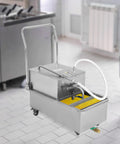 550W Commercial Kitchen Fryer Oil Filter Machine With Stainless Steel Tank And Separator Pump on wheels in a restaurant kitchen.