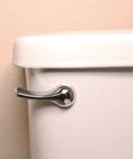 Universal Metal Toilet Tank Lever Chrome Replacement Handle With 8 Inch Lift Arm And Adjustable Chain Holes For Most Toilets Easy Install Durable And Long Lasting Performance installed on toilet tank.