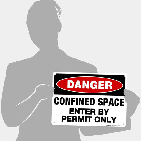 Lock Up Your Worksites With This Sick Danger Confined Space Safety Sign Solid Aluminum Permit Only Plaque held by a person.