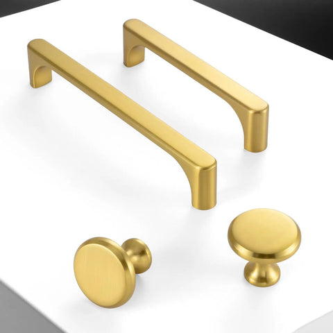 Rock Solid Brushed Gold Cabinet Pulls Kitchen Handles 5 Inch 128mm Centers Heavy Duty Drawer Hardware 10 Pack Rust Resistant Metal Build Designed For A Quick Swap Upgrade displayed with two long handles and two round knobs.