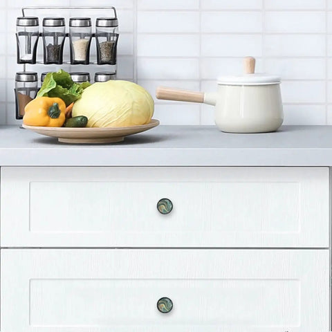 Premium Green Marble Drawer Knobs And Cabinet Pulls 4 Pack on white drawers, enhancing kitchen decor with green marble design.