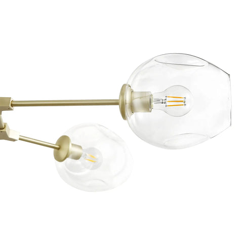 Close-up of Matte Gold Five Light Adjustable Chandelier Pendant With Clear Glass Shades Dope Modern Ceiling Lighting Fixture