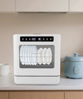 1.8 Gallon Countertop Dishwasher In White With Four Wash Modes And 360 Degree Spray Arms for cleaning plates on kitchen counter.