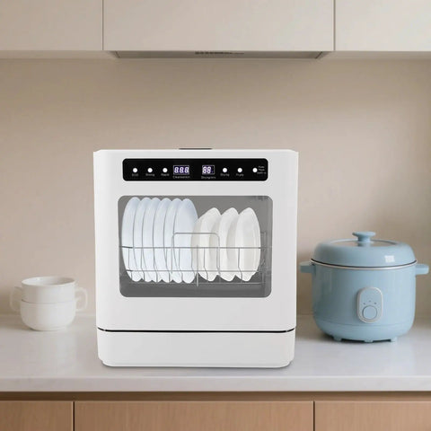 Compact Countertop Dishwasher 1.8 Gallon Capacity Plug And Play Portable Unit With Four Efficient Wash Cycles in kitchen countertop with plates.